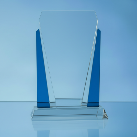 glass palque award with blue edges and a blue background 