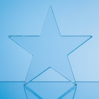 Clear glass star on a blue background