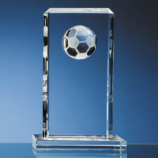 GLASS CRYTAL FOOTBAL TROPHY ON BLUE BACKGROUND