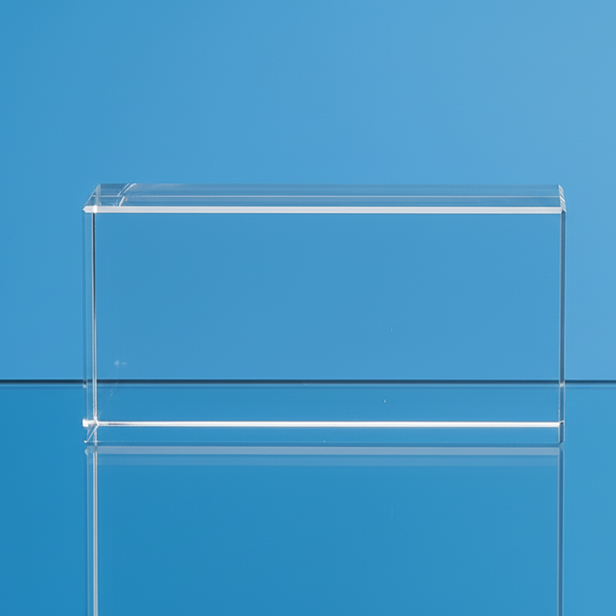 Clear glass block on a blue background