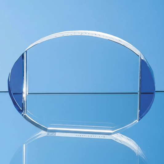 Clear glass object on a blue background