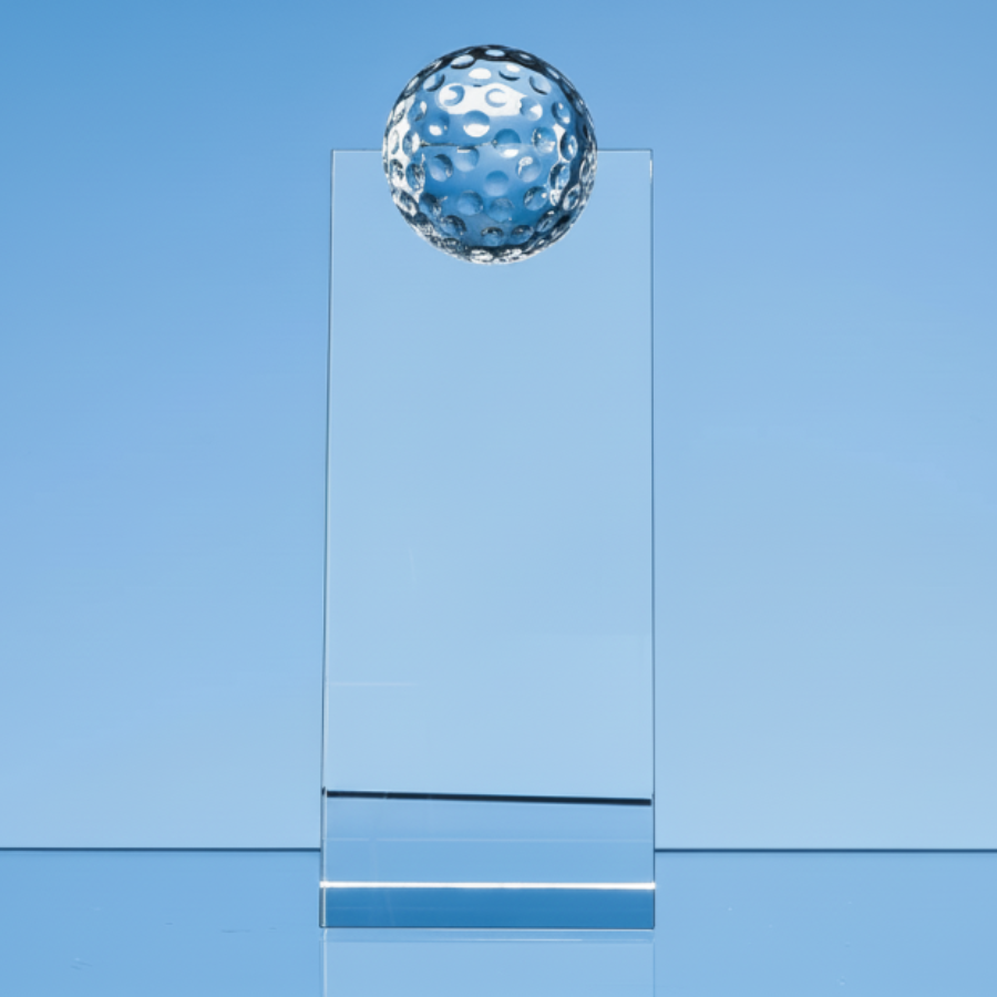 golf trophy in glass wedge with gol ball at top 