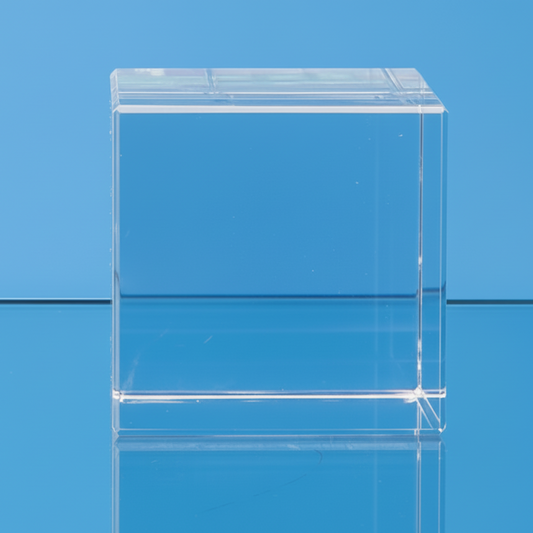 Clear glass block on a blue background