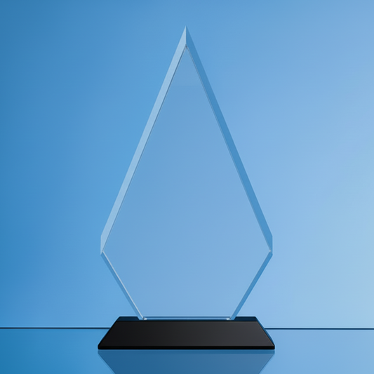 Glass award on a black base against a blue background