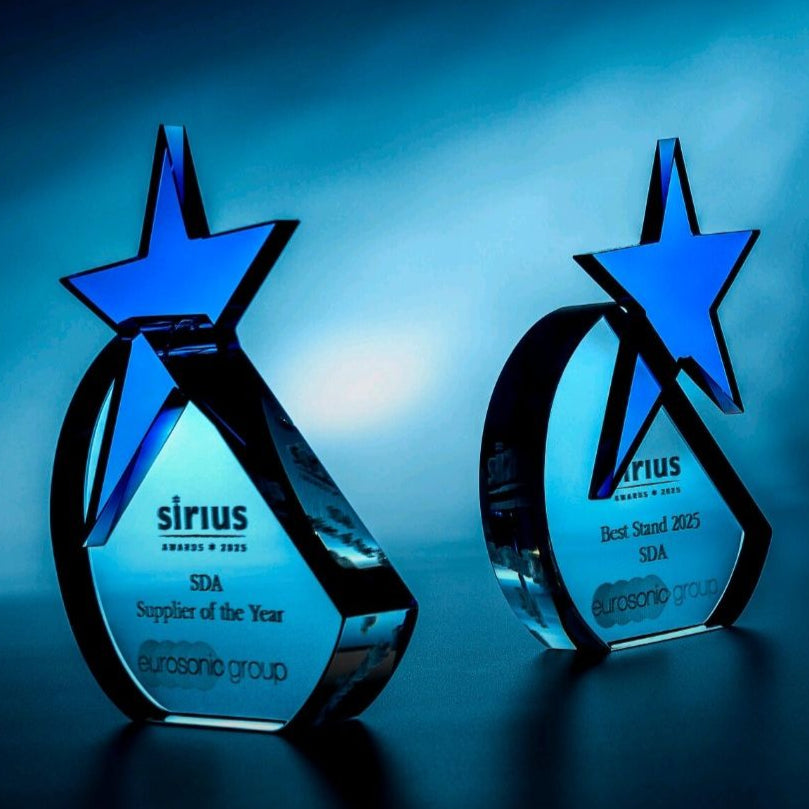 Two star-shaped glass awards with 'Sirius' branding on a blue background