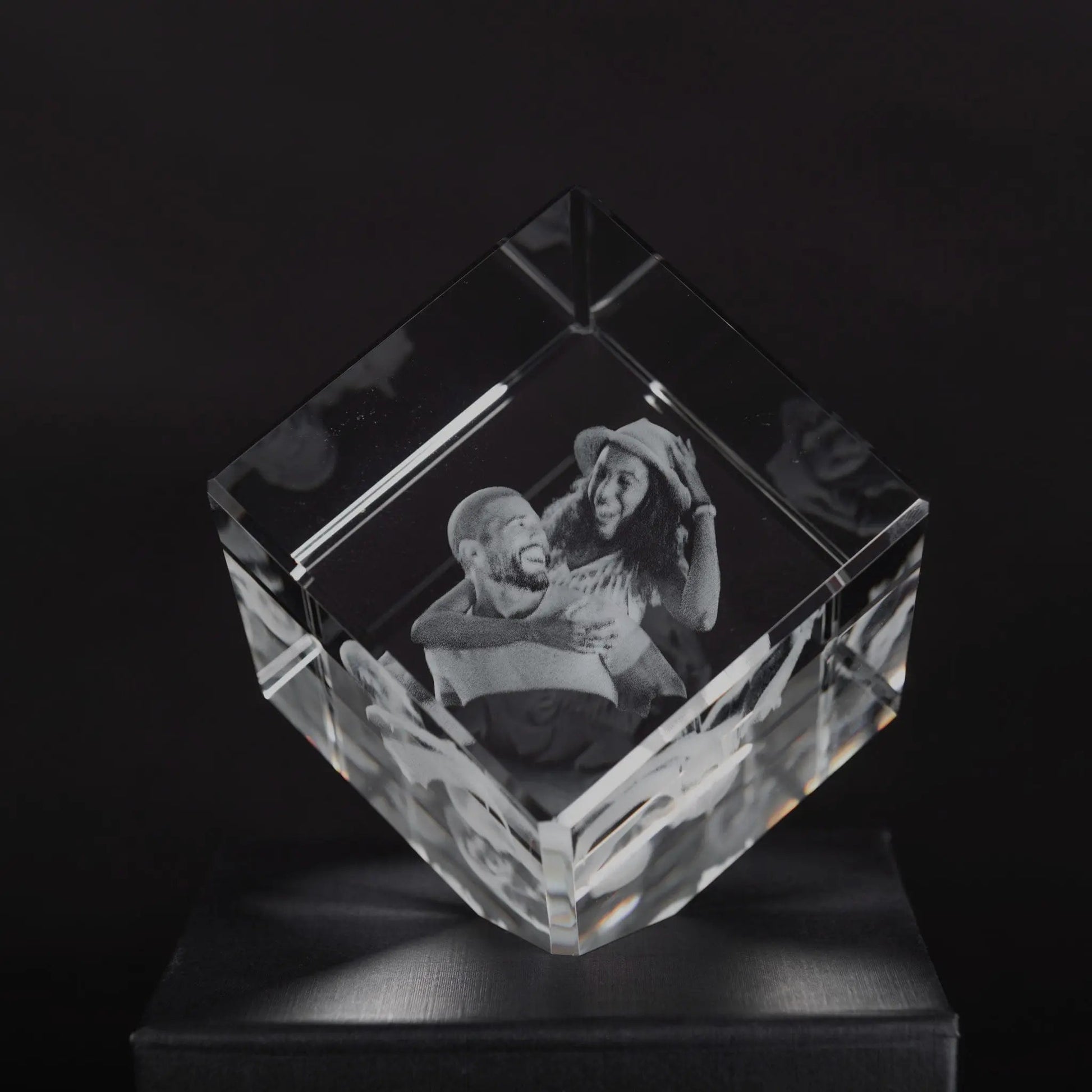 3d crystal photo gift of a happy couple lit up by LED